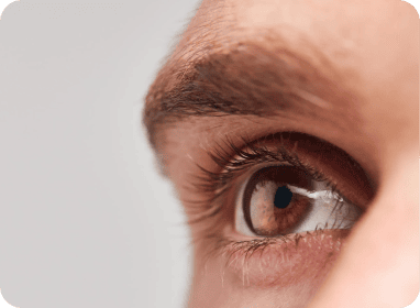 Close-up of a human eye, symbolizing focus and precision in clinical research.